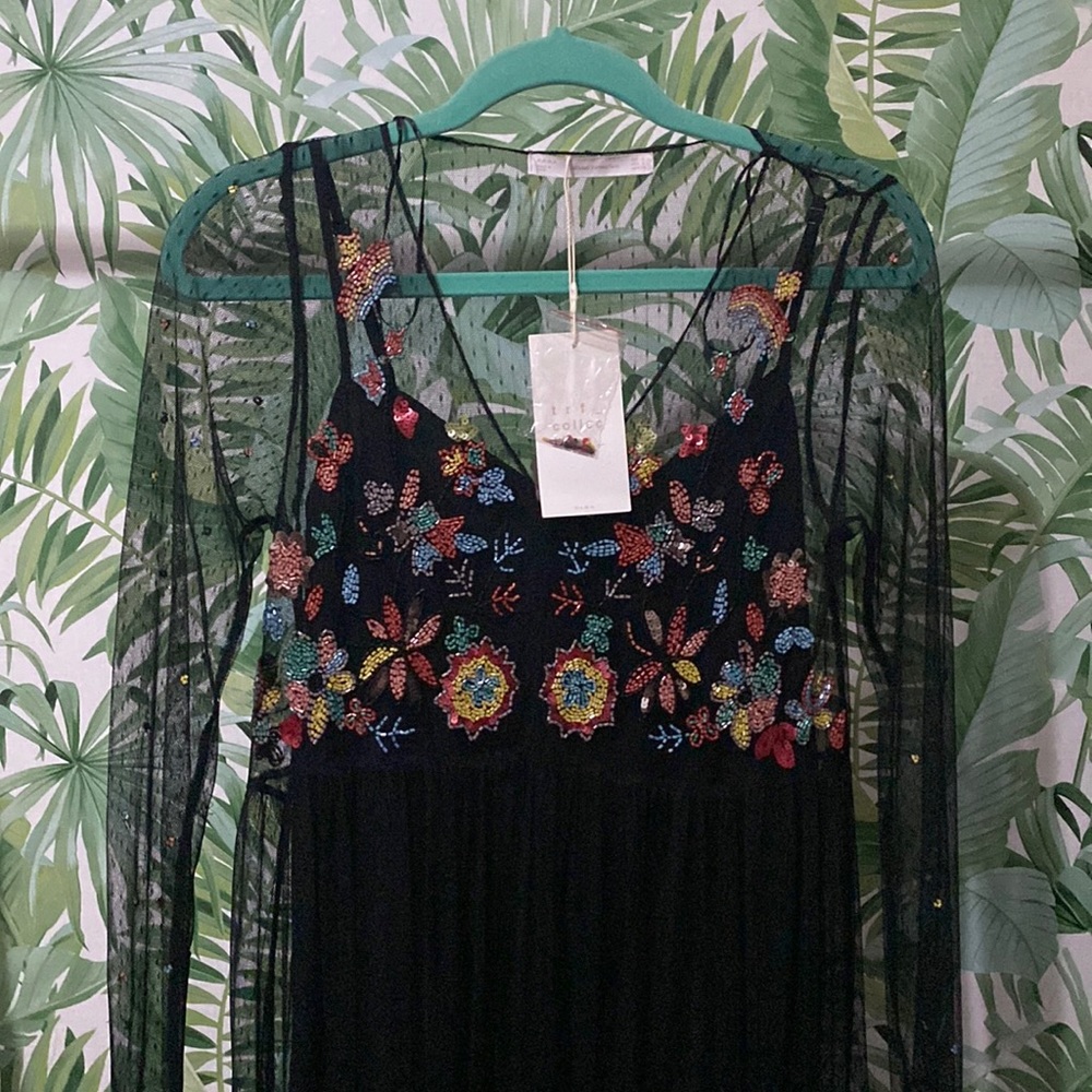 Black lace dress with bead work.